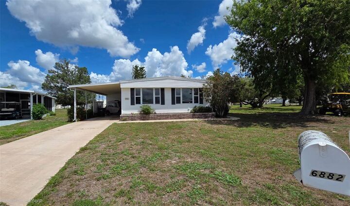 Property Photo:  6882 Holo Court  FL 34287 