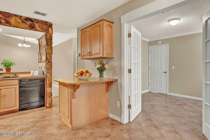 Property Photo:  11764 Wattle Tree Road N  FL 32246 