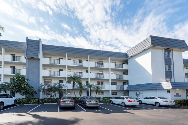 Property Photo:  6100 NW 44th Street 302  FL 33319 