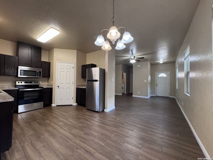 Property Photo:  8711 8th  TX 78109 