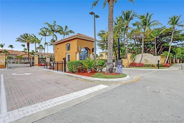 Property Photo:  9640 NW 2nd St 5-105  FL 33024 