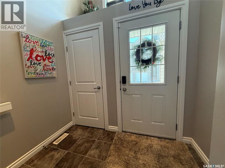 Property Photo:  2 697 Sun Valley Drive  SK S4A 2X7 