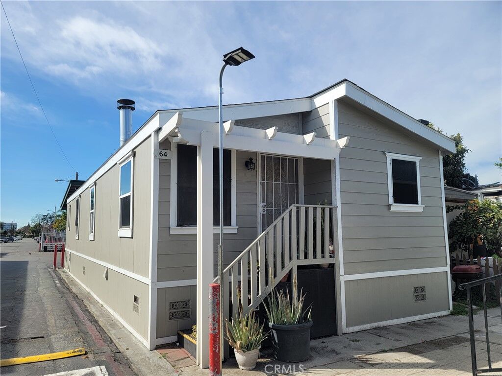Property Photo:  12265 Woodruff Avenue 64  CA 90241 