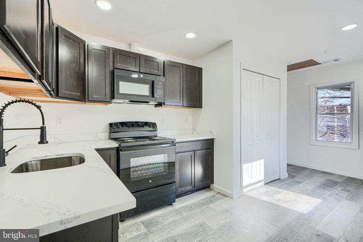 Property Photo:  7 S Carrollton Avenue  MD 21223 