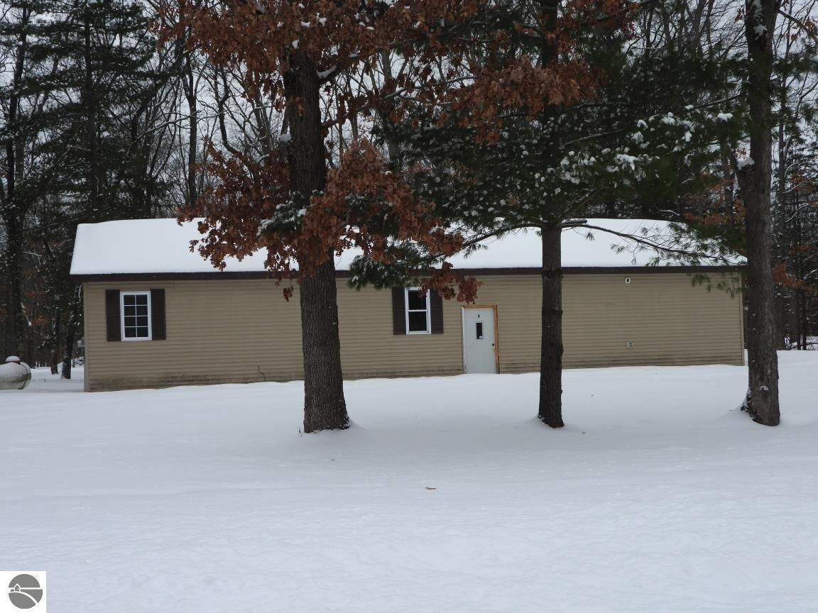 Property Photo:  7861 N Bass Lake Road  MI 49644 