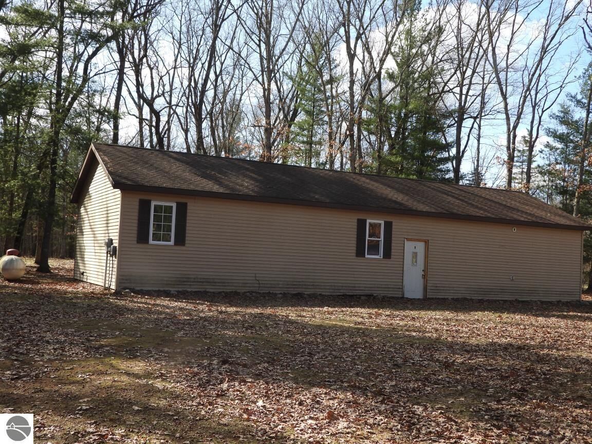 Property Photo:  7861 N Bass Lake Road  MI 49644 