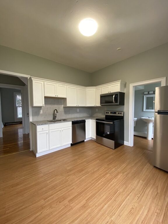 Property Photo:  50 Congress St 1  MA 01757 