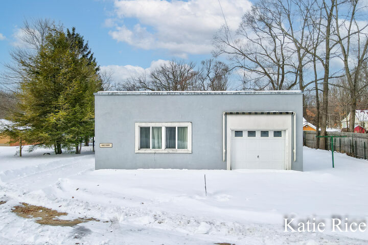 Property Photo:  8431 Meade Street  MI 49437 