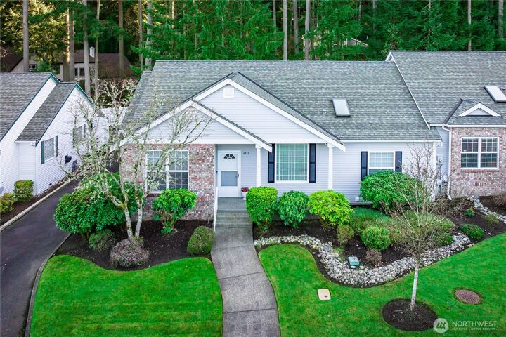 Property Photo:  6910  51st Street Ct W 14A  WA 98467 
