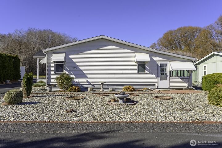 Property Photo:  2361  Basin Street NW 203  WA 98823 