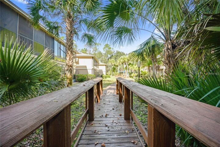 Property Photo:  120 Hibiscus Woods Court 4B  FL 32725 