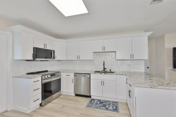 Property Photo:  4718 W Oklahoma Avenue  FL 33616 