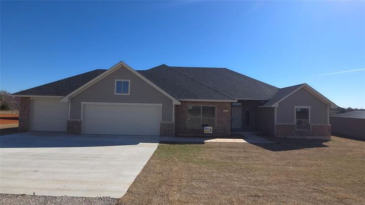 Property Photo:  1981 Preakness Path  OK 73010 