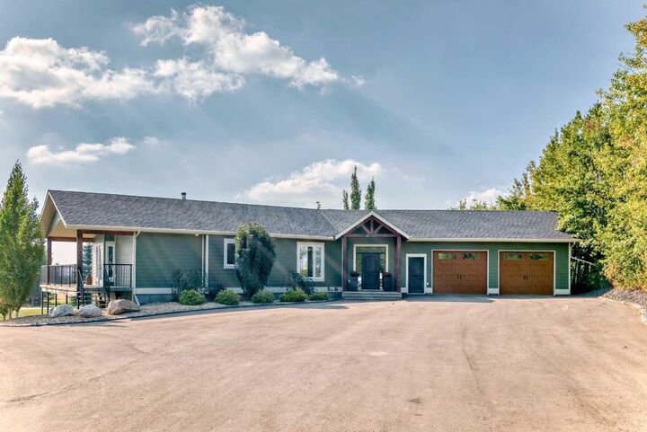 Property Photo: 254041 Township Road 435 AB T4J 1R2