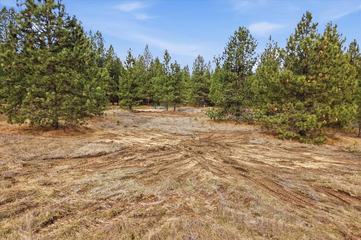 Property Photo:  65xx Whispering Pines Way Lot #1  WA 99026 