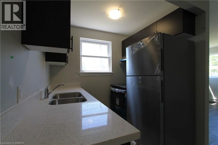 Property Photo:  116 King Edward Avenue 6  ON N5Z 3T1 