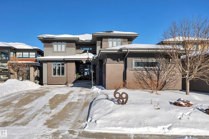 Property Photo: 699 Howatt Drive SW AB T6W 3K3