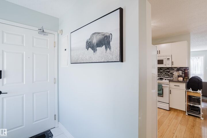 Property Photo:  8907 106A Avenue NW 310  AB T5H 3Y7 