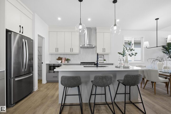 Property Photo: 3704 Cross Landing SW AB T6W 4M8