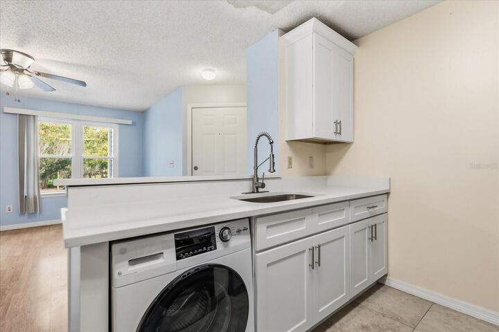 Property Photo:  2612 Grassy Point Drive 208  FL 32746 