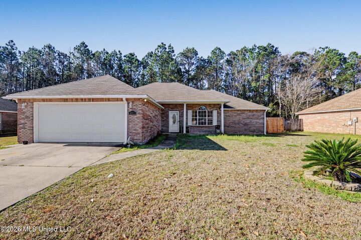 Property Photo:  6911 Pinehurst Drive  MS 39564 