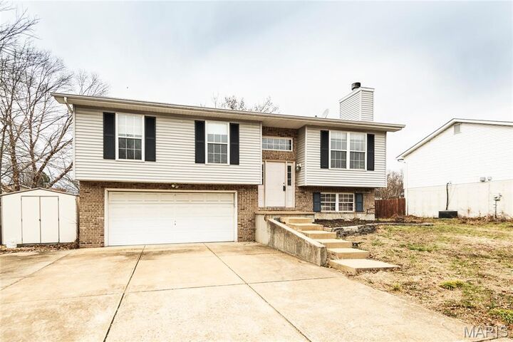 Property Photo:  1001 Parc Central Drive  MO 63028 