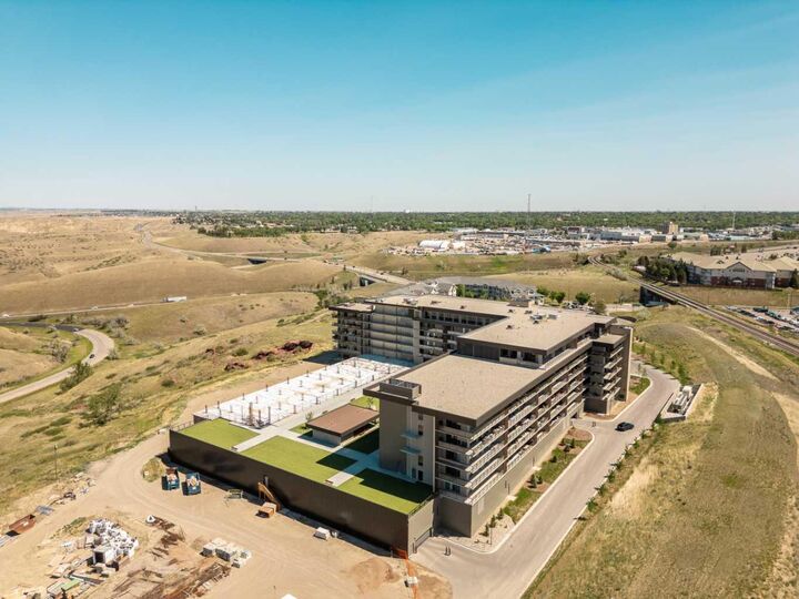 Property Photo: 102 Scenic Drive N 218 AB T1J 0J4