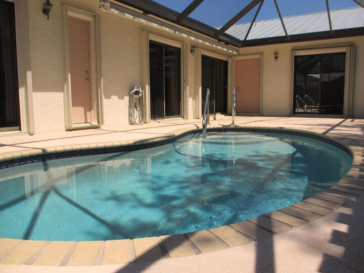 Property Photo: 8853 Andy Court A FL 33436