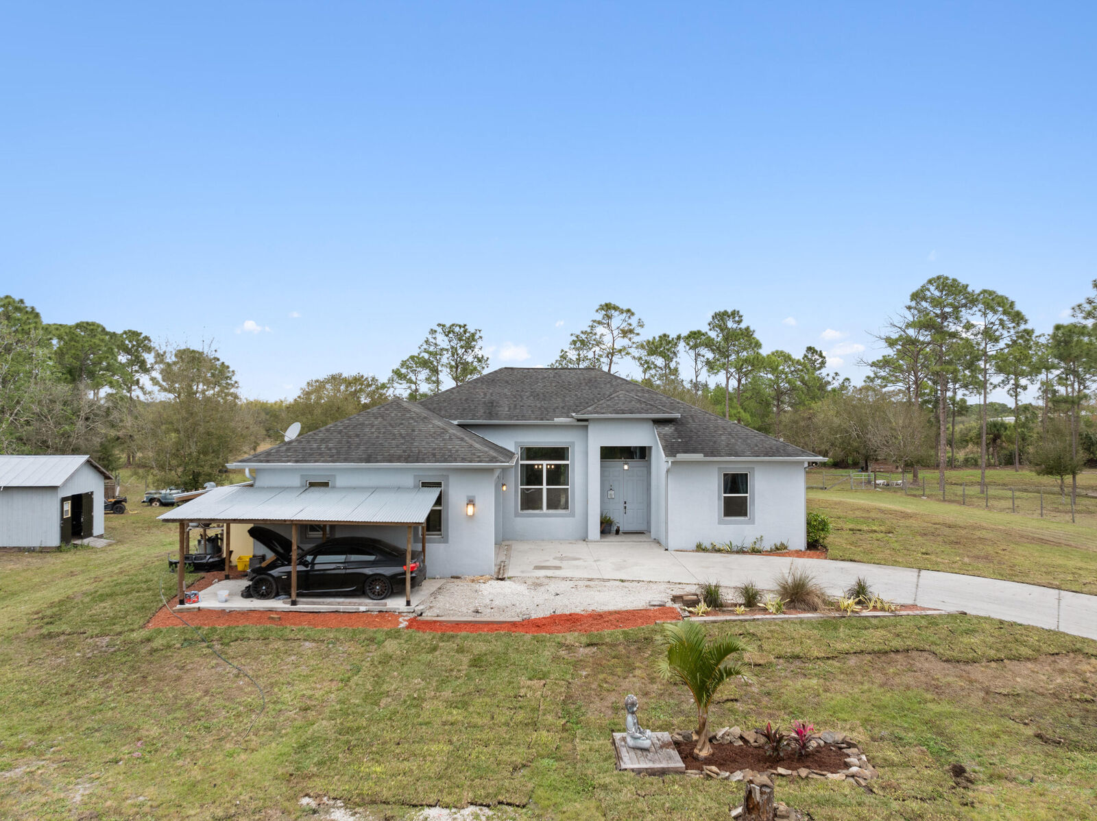 Property Photo: 6347 SW Travers Street FL 34990