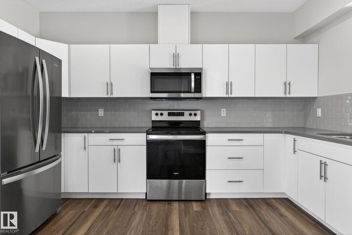 Property Photo:  1051 Graydon Hill Boulevard SW 45  AB T6W 3C8 