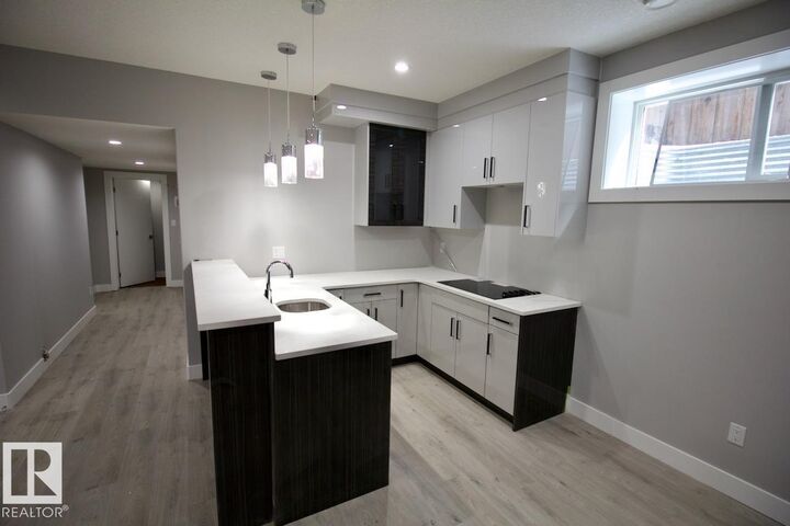 Property Photo: 1326 Hainstock Way SW Bsmt AB T6W 3B6