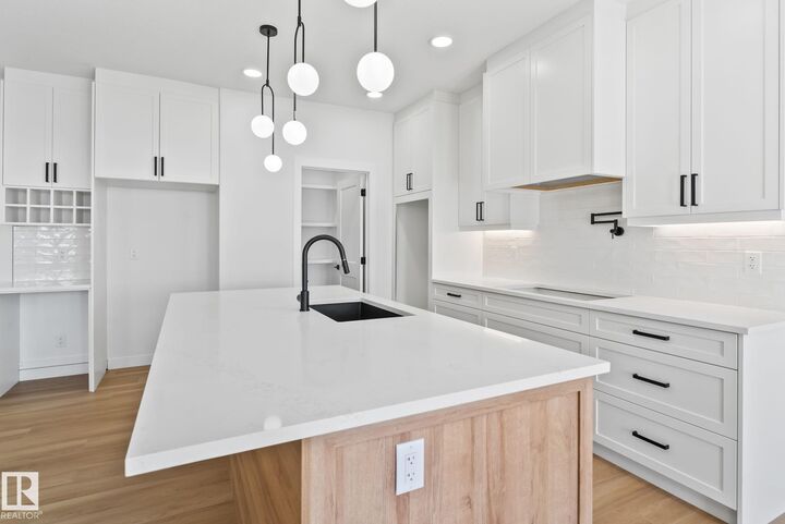 Property Photo: 1411 Redpoll Court NW AB T5S 0V4