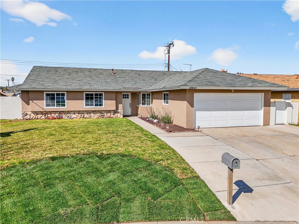 Property Photo:  12671 Hollyglen  CA 92503 