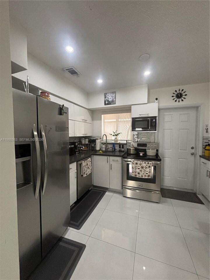 Property Photo:  5271 NW 5th St 5271  FL 33126 