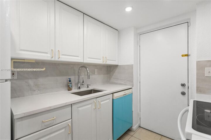 Property Photo:  17500 NW 68th Ave D1004  FL 33015 