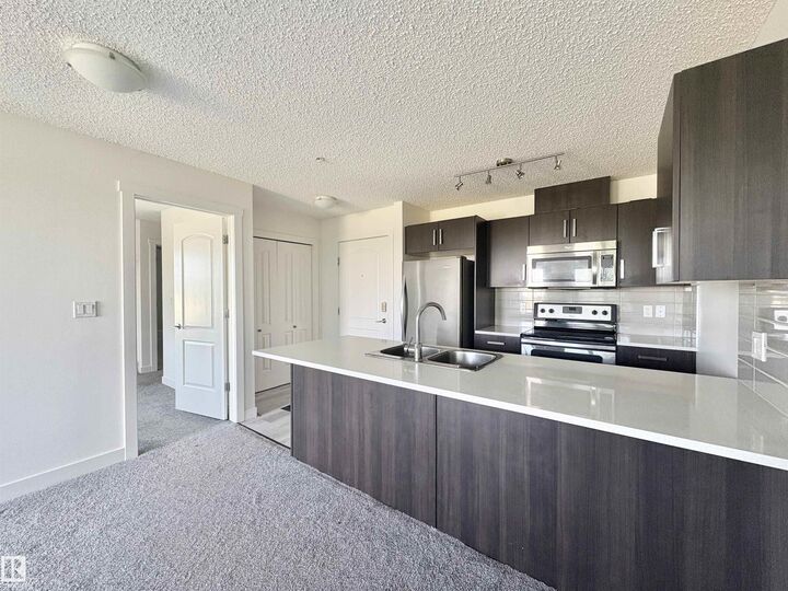 Property Photo:  667 Watt Boulevard SW 312  AB T6X 0Y2 