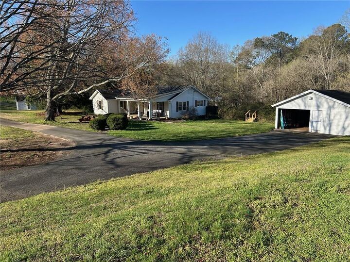 Property Photo:  4299 E Cherokee Drive  GA 30115 