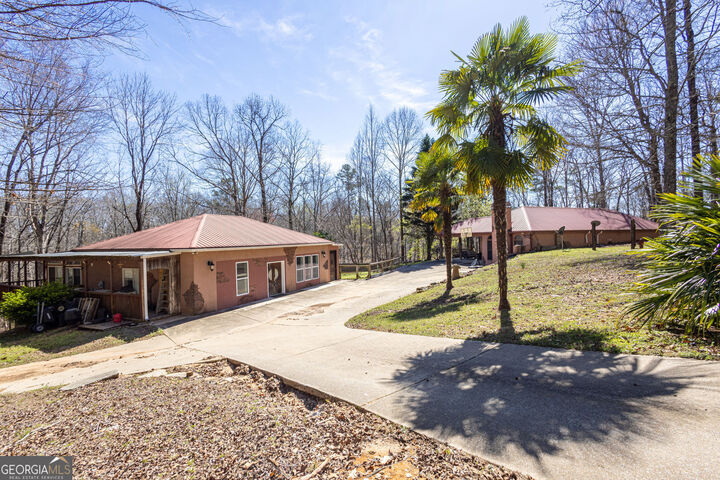 Property Photo:  9011 Highpoint Road  GA 30180 