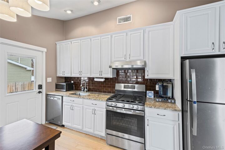 Property Photo:  432 Bohemia Parkway  NY 11782 