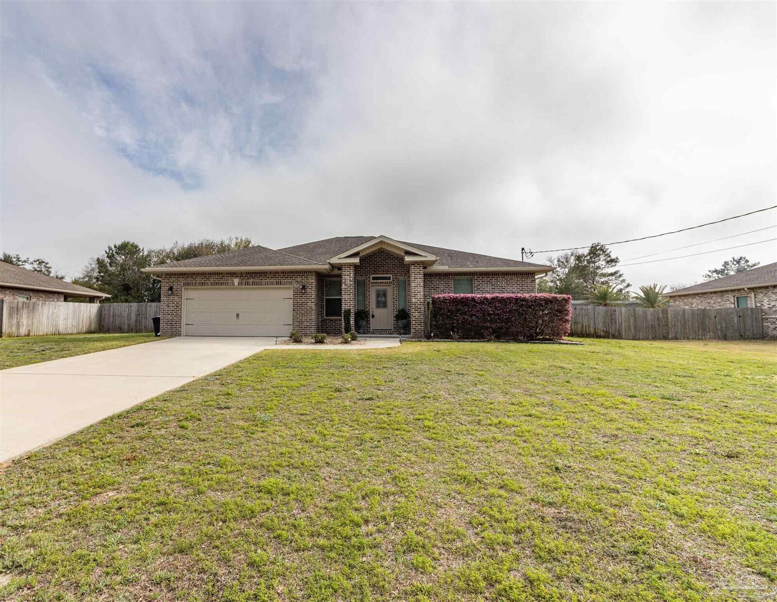 Property Photo:  8283 Calle Mio  FL 32566 