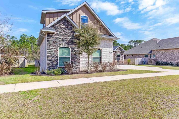 Property Photo:  5824 Huntington Creek Blvd  FL 32526 