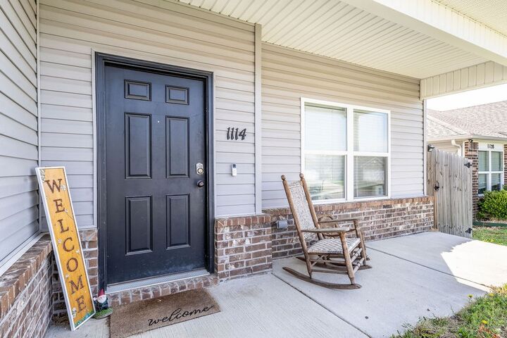 Property Photo:  1114 S Kingfisher Lane  AR 72701 