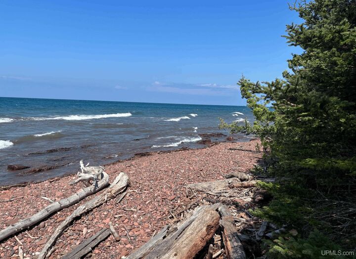 Property Photo:  2741 Sunset Bay Beach Road  MI 49805 