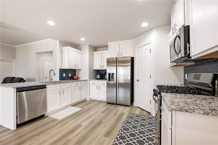 Property Photo:  5803 SW Peaceful Avenue  AR 72713 