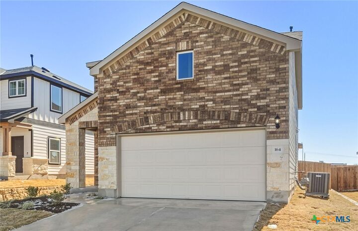Property Photo: 164 Golden Bell Way TX 78610
