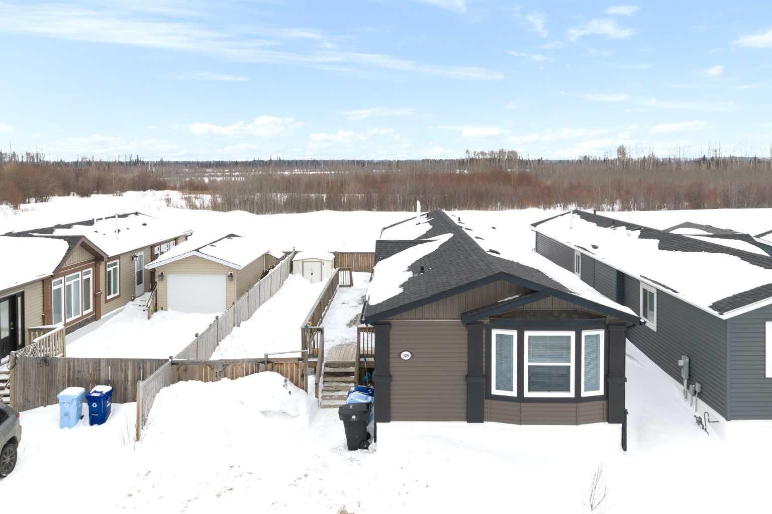Property Photo:  309 McKinlay Crescent  AB T9K 2M9 