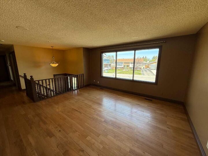 Property Photo: 202 Maligne Drive AB T7V 1J5