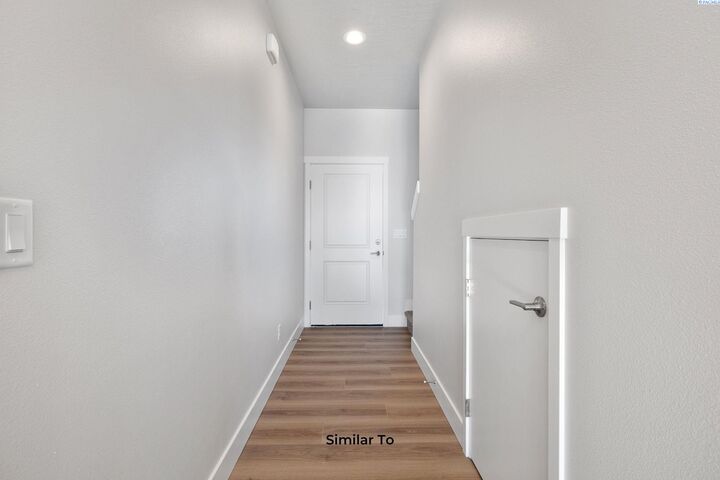 Property Photo:  206 N Dewberry Pl  WA 99336 