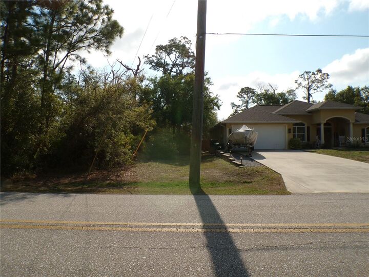 Property Photo:  13487 Eisenhower Drive  FL 33953 