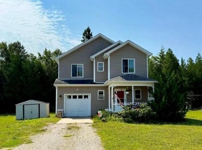 Property Photo:  640 W Spring St  MI 49781 